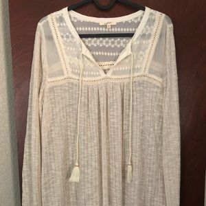 Adorable cream tunic. Worn only once!